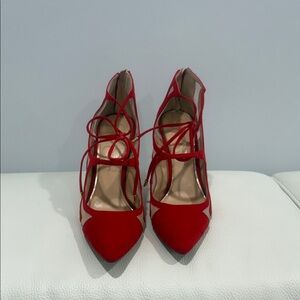Jessica Simpson red pumps